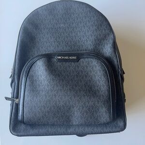 Black monogram Michael kor backpack